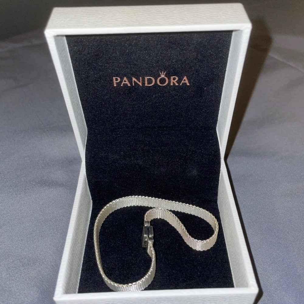 Sterling Silver Pandora Reflexions bracelet, never worn